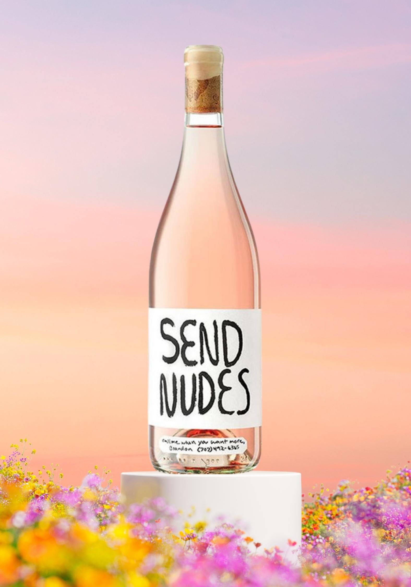 Wine bottle with a humorous label against a colorful, blurred background