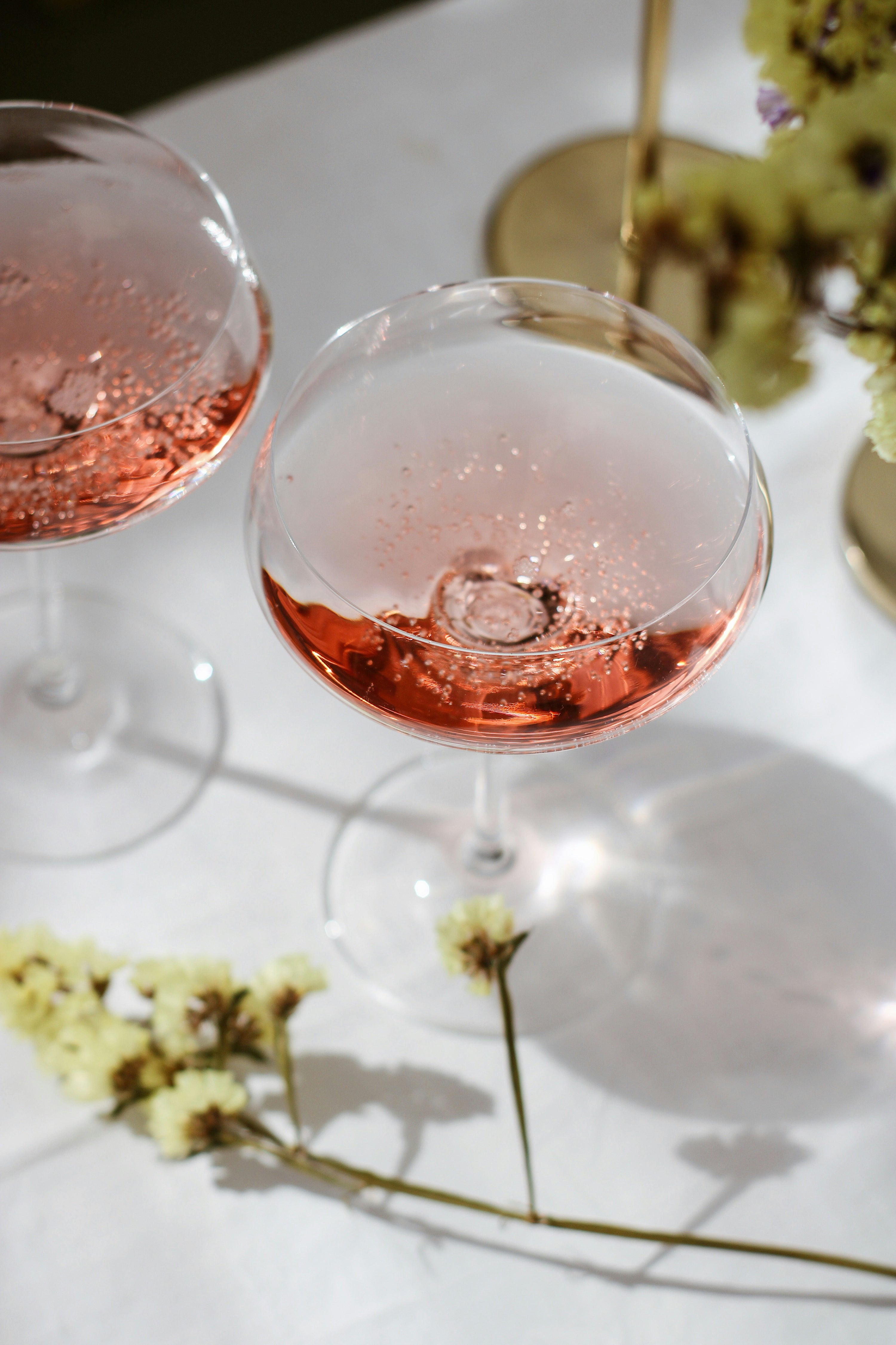 bubbly rose in a coupe glass